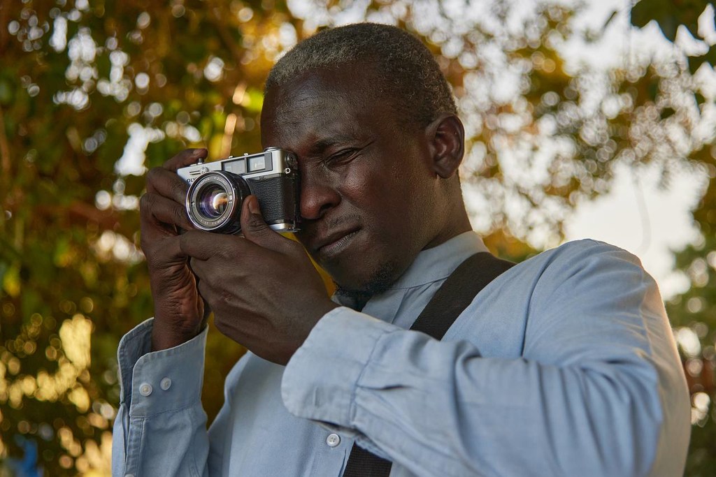 علاء خير مصور صحفي سوداني.